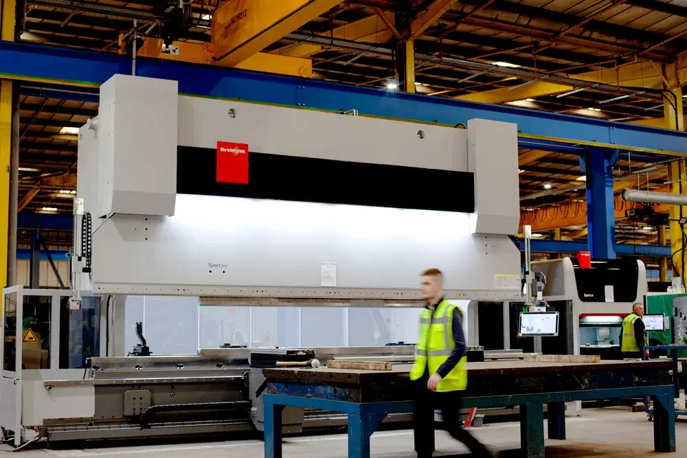 Press braking bay with PP Group operator moving infront